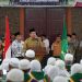 Disambut Kumandang Azan Disaat Hujan, Kloter 1 Debarkasi Medan Tiba di Tanah Air