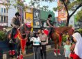 Polisi Berkuda Amankan Car Free Day Margonda, Warga Antusias Berinteraksi